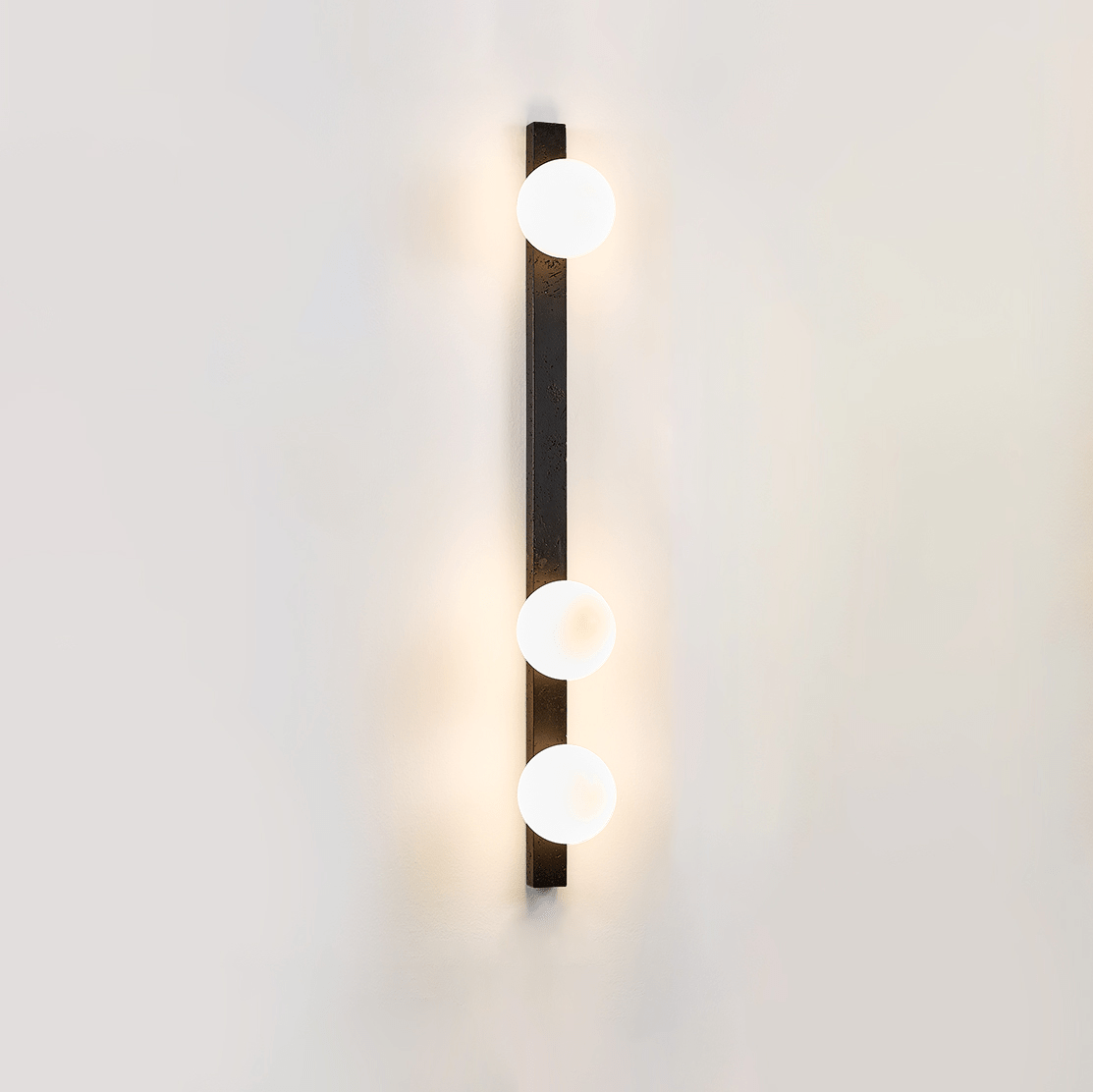 Zoshaira Globe Black Travertine Wall Sconce