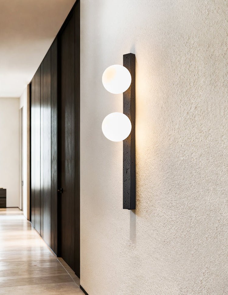 Zoshaira Globe Black Travertine Wall Sconce