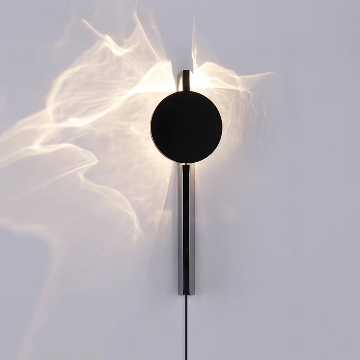 Kinetic Shadow Plug-in Wall Lamp
