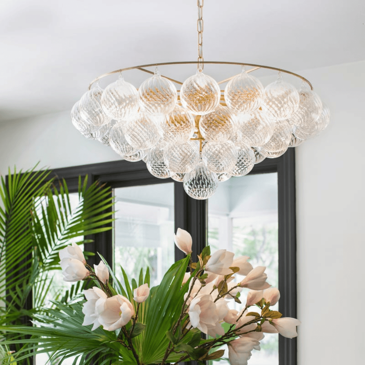 Velineon Chandelier Clear Glass Globe Aged Brass Elegant