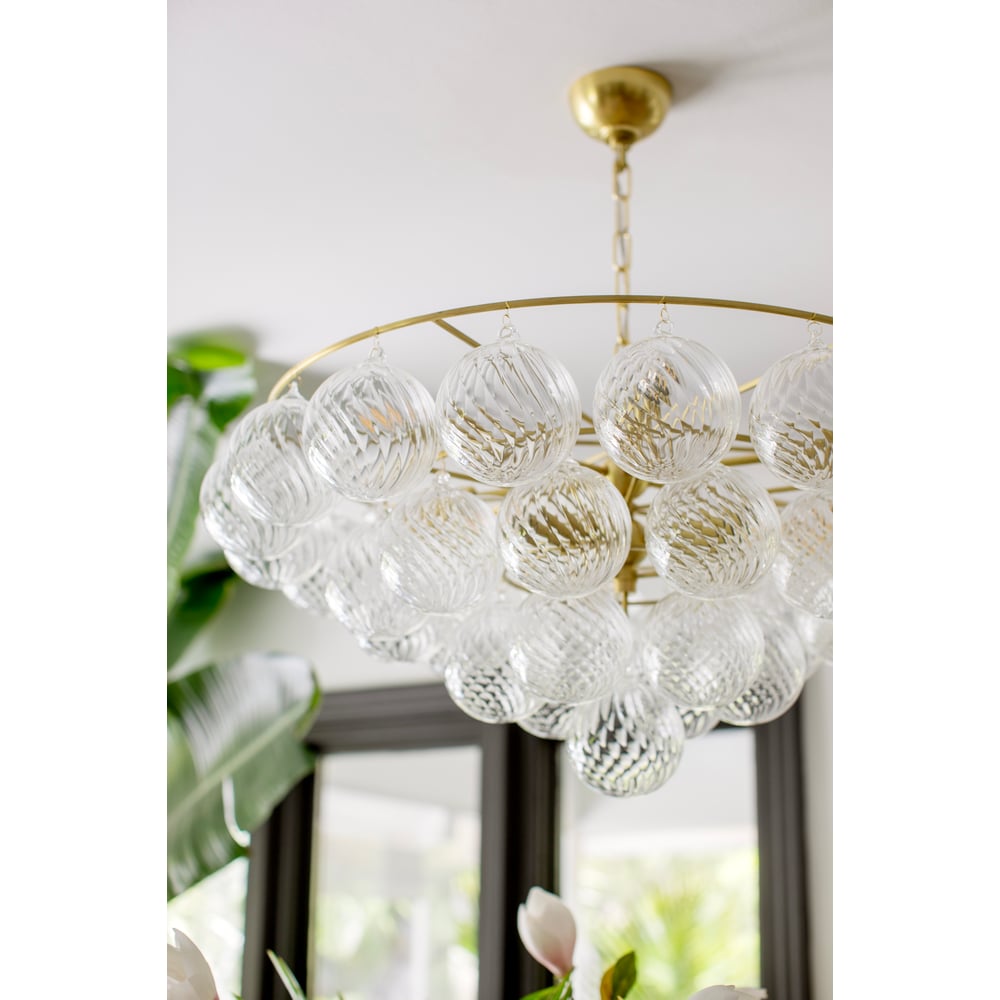 Velineon Chandelier Clear Glass Globe Aged Brass Elegant