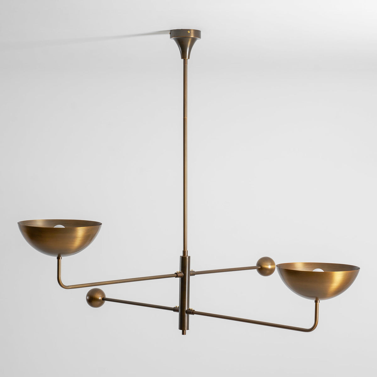 Vela Brass two-head ceiling chandelier