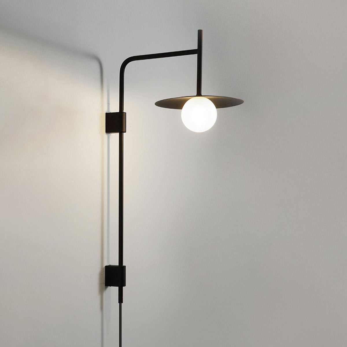 Paxon Swing Arm Plug-in Glass Wall Lamp