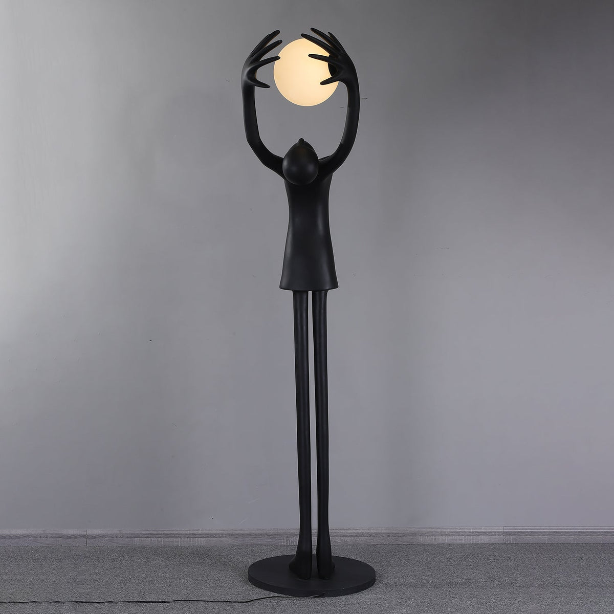 Lynorel Figurative Black Floor Lamp