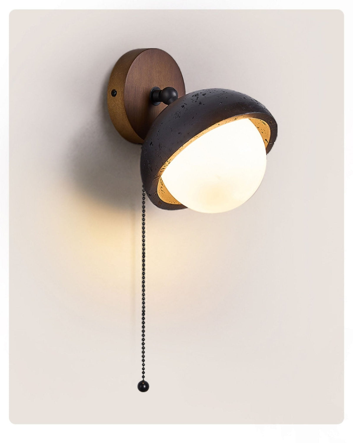 Serenaria Globe Black Travertine Pivot Sconce