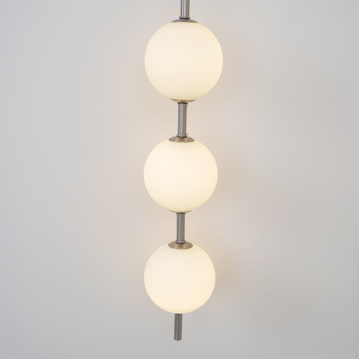 Astrid Vertical Globe Wall Light